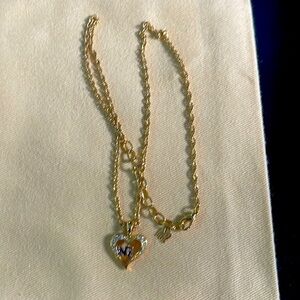Nina Ricci Gold Heart Necklace with Silver Accents